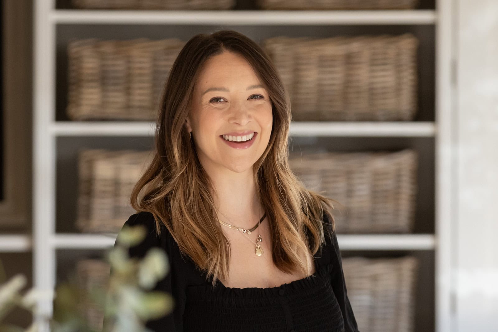 Interior designer smiles into the camera