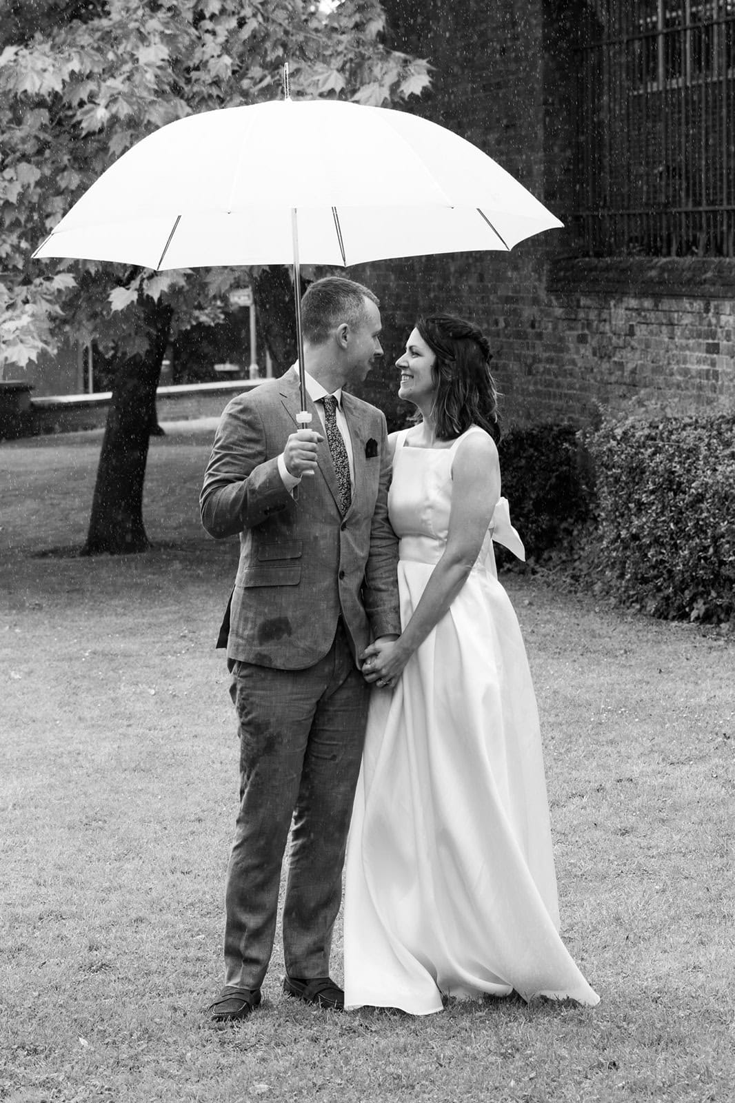 A black and white image of a newly married couple after an intimate wedding at St Albans Registry Office