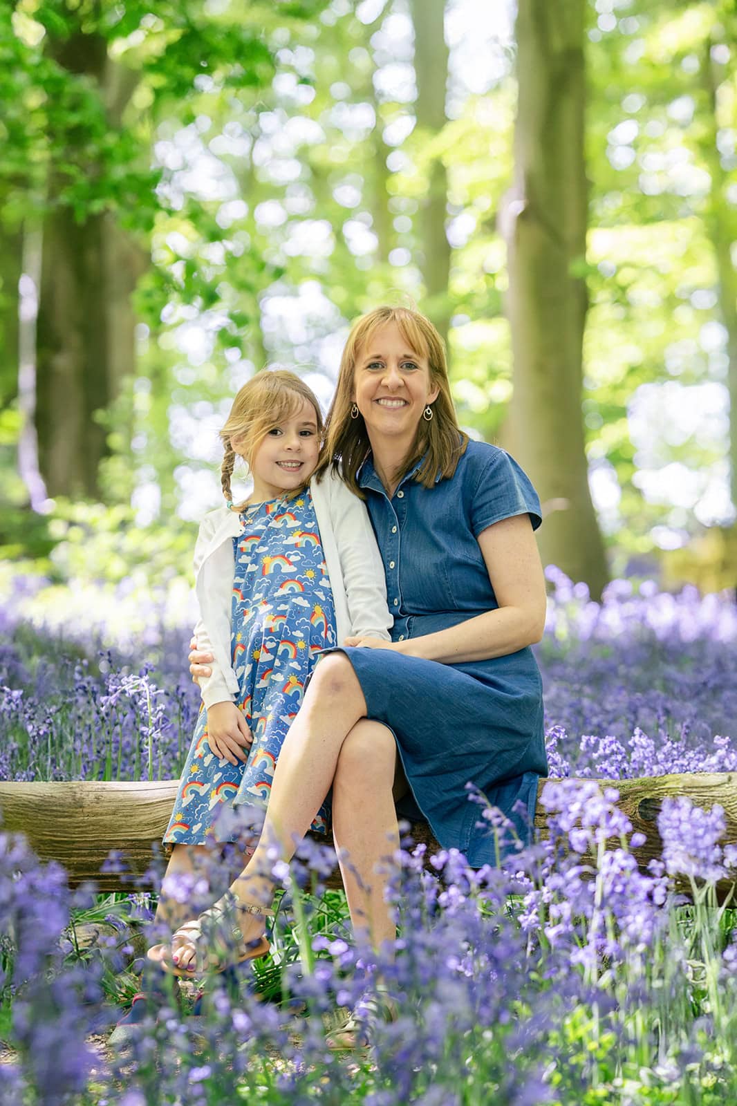 A portrait of a mother and daughter surrounded by beautiful bluebells near Tring